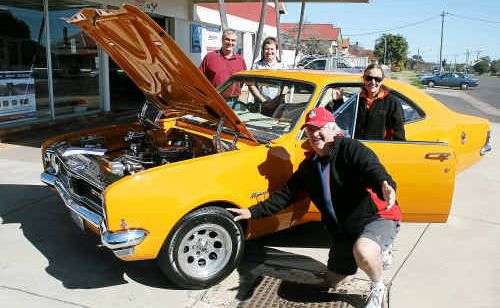 Monaro Club of Queensland treasurer Darryl Lonergan and secretary Shane Horswill with proud owners of the 1970 186S HT Monaro Bob and Narelle Corbett which was parked outside Lane Motors on Saturday morning to promote the Monaro Nationals being held in Warwick the first weekend in September. Monaro Club of Queensland treasurer Darryl Lonergan and secretary Shane Horswill with proud owners of the 1970 186S HT Monaro Bob and Narelle Corbett which was parked outside Lane Motors on Saturday morning to promote the Monaro Nationals being held in Warwick the first weekend in September.